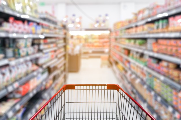 blur-supermarket-aisle-with-empty-red-shopping-cart-56345-232-1622965713.jpeg